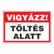 VIGYÁZAT! TÖLTÉS ALATT!